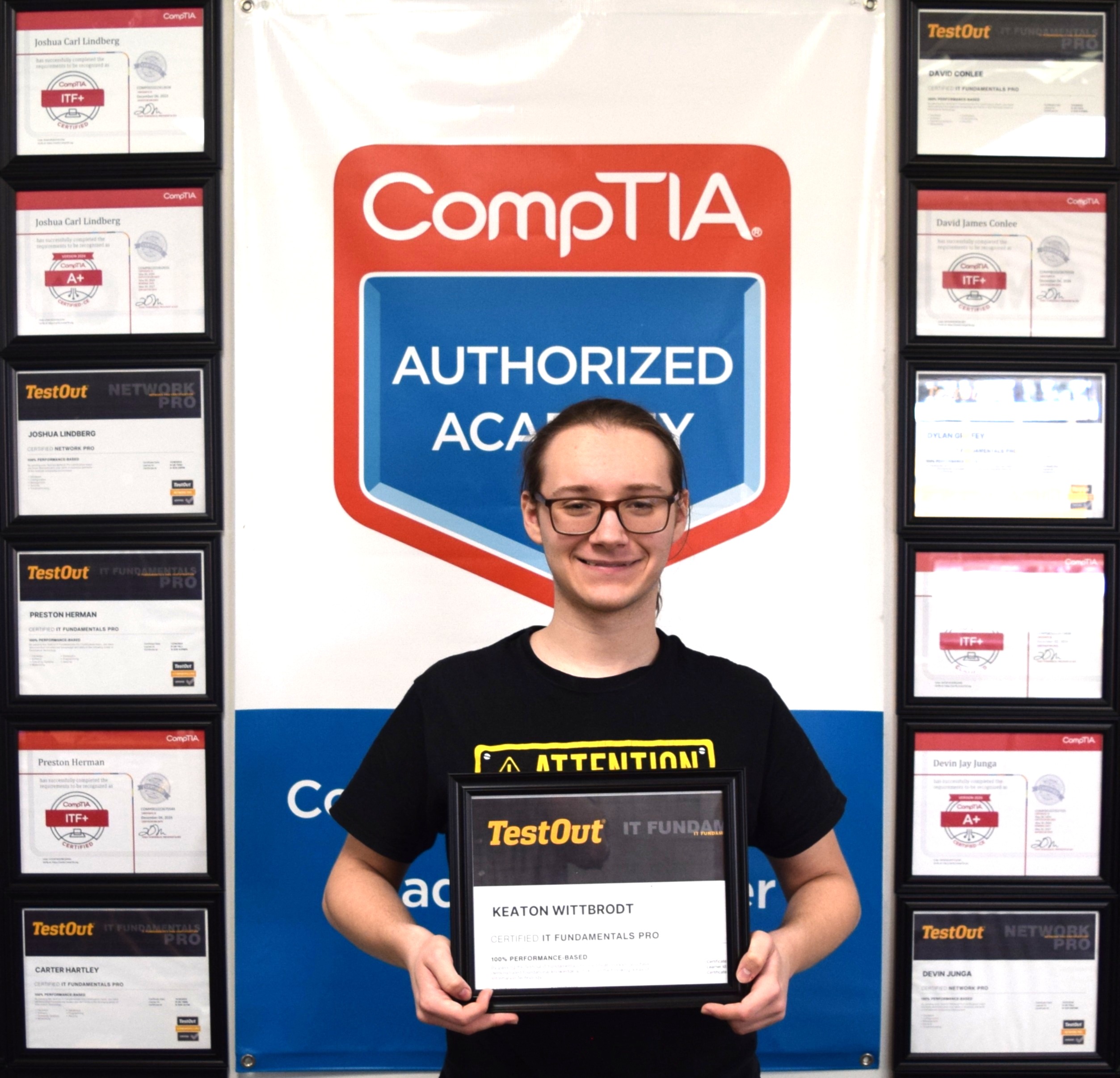 Marlette student holding earned certifications
